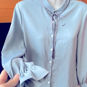 Blue small long sleeve top, good for office